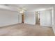 Expansive bedroom space with large windows and carpeted flooring at 404 Bar Ct, Kissimmee, FL 34759