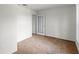 Neutral bedroom featuring neutral carpeting and a glass paneled door at 404 Bar Ct, Kissimmee, FL 34759