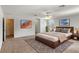 Spacious main bedroom with modern furnishings and large windows at 404 Bar Ct, Kissimmee, FL 34759