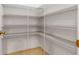 Spacious walk-in pantry with wire shelving for ample storage at 404 Bar Ct, Kissimmee, FL 34759