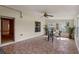 Inviting sunroom featuring tile floors and great natural light. This cozy area is great for relaxation at 404 Bar Ct, Kissimmee, FL 34759