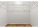 Interior closet features wire shelving and neutral carpeting at 404 Bar Ct, Kissimmee, FL 34759