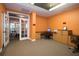 Resident business center with computer, cabinets, carpet, and French doors at 506 Mirasol Cir # 202, Celebration, FL 34747