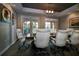 Office conference room with large wooden table and comfortable executive chairs at 506 Mirasol Cir # 202, Celebration, FL 34747