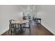 Dining room and living room combination with hardwood floors and plenty of natural light at 506 Mirasol Cir # 202, Celebration, FL 34747