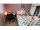 Inviting bedroom with a bed and a desk workspace at 5169 Dove Tree, Orlando, FL 32811