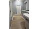 Upstairs hallway features neutral walls and floors, a clean design, and white doors at 5169 Dove Tree, Orlando, FL 32811