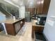 Well-equipped kitchen featuring stainless steel appliances and granite countertops at 5169 Dove Tree, Orlando, FL 32811