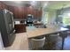 Beautiful kitchen with stainless steel appliances, granite countertops, and ample lighting at 5169 Dove Tree, Orlando, FL 32811