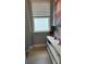 Upstairs landing with window providing natural light, a neutral color scheme, and ample storage at 5169 Dove Tree, Orlando, FL 32811