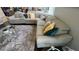 Living room with a large sectional sofa with plush cushions, a glass table, and a soft rug at 5169 Dove Tree, Orlando, FL 32811