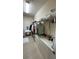 Spacious walk-in closet with a well-organized shelving system and plenty of hanging space for clothes and accessories at 5169 Dove Tree, Orlando, FL 32811