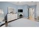 Relaxing bedroom offers natural light, a dresser, and a comfortable vanity at 6027 Strada Isle Way, Orlando, FL 32835