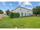 Well-maintained two-story building with green lawn and tasteful landscaping at 6027 Strada Isle Way, Orlando, FL 32835