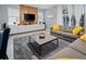 Spacious living room with stylish decor, large rug, and bright lighting at 6027 Strada Isle Way, Orlando, FL 32835