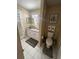 Clean bathroom featuring a single sink vanity and tiled floors at 6328 Raleigh St # 814, Orlando, FL 32835