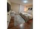 Comfortable bedroom with neutral tones and a plush rug at 6328 Raleigh St # 814, Orlando, FL 32835