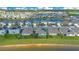 Aerial view of houses with lakes and community with solar panels at 633 Greymount St, Davenport, FL 33837