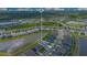 Aerial view shows the home is close to the lake and surrounding community at 633 Greymount St, Davenport, FL 33837