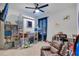 Playful bedroom with custom-built loft bed and fun decor at 633 Greymount St, Davenport, FL 33837