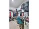Spacious closet with a vanity and shelving providing ample storage space at 633 Greymount St, Davenport, FL 33837