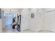 Inviting home hallway with tile flooring, neutral decor, and ample natural light from the front door at 633 Greymount St, Davenport, FL 33837