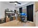 Bright home office setup with dual monitors and comfortable workspace at 633 Greymount St, Davenport, FL 33837