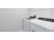 Modern white washer and dryer set in a dedicated laundry area at 6331 Breeze Filled Ln, Winter Garden, FL 34787