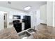 Well-maintained kitchen with stainless steel sink and black appliances at 645 Stafford Ter # 163, Altamonte Springs, FL 32714