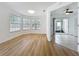 Bright living room with wood flooring, bay window and open access to tiled outdoor patio at 645 Stafford Ter # 163, Altamonte Springs, FL 32714