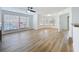 A light and airy living room showcasing laminate floors, expansive windows, and ample space at 645 Stafford Ter # 163, Altamonte Springs, FL 32714