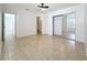 Bright main bedroom featuring a bathroom, and closet with mirrored doors at 645 Stafford Ter # 163, Altamonte Springs, FL 32714