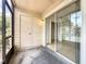 Enclosed screened patio with outside storage closet and view to the interior at 645 Stafford Ter # 163, Altamonte Springs, FL 32714