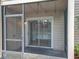 View of the screened-in patio with sliding doors leading to the interior of the home at 645 Stafford Ter # 163, Altamonte Springs, FL 32714