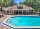 Beautiful community pool with a pavilion lounge area providing shade at 645 Stafford Ter # 163, Altamonte Springs, FL 32714
