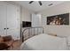 Bedroom showcasing hardwood floors, a bed, and decorative accents at 7191 Old Melbourne Hwy, St Cloud, FL 34771