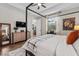 Inviting main bedroom featuring wood floors and a decorative canopy bed at 7191 Old Melbourne Hwy, St Cloud, FL 34771