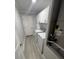 Laundry room featuring modern washer and dryer units, with white cabinetry for extra storage at 732 Palma Dr, Lady Lake, FL 32159