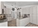 Well-appointed kitchen featuring stainless steel appliances, sleek countertops and a view of the breakfast area at 8625 Vista Point Cv, Orlando, FL 32836