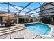 Pool area with grill, dining table, and outdoor seating space at 8625 Vista Point Cv, Orlando, FL 32836