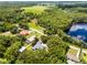 Overhead of home showing its location in relation to a lake and other houses at 9642 Florida Boys Ranch Rd, Clermont, FL 34711