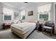 Cozy bedroom with carpet, soft natural light, and neutral walls offer a relaxing space at 9642 Florida Boys Ranch Rd, Clermont, FL 34711