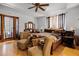 Main bedroom features hardwood floors, comfortable seating area and lots of natural light at 9642 Florida Boys Ranch Rd, Clermont, FL 34711