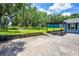 Spacious brick patio with a pergola, perfect for outdoor dining and entertaining at 9642 Florida Boys Ranch Rd, Clermont, FL 34711