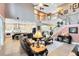 Open concept living area showcasing the kitchen, living room and stairs to the second floor at 11850 Sheltering Pine Dr, Orlando, FL 32836