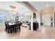 Inviting living and dining spaces with elegant furnishings and a welcoming atmosphere at 11850 Sheltering Pine Dr, Orlando, FL 32836