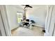 Bright bedroom featuring a ceiling fan, natural light, and comfortable furniture at 12621 Tanja King Blvd, Orlando, FL 32828