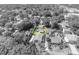 A charming single-story home, surrounded by lush greenery and mature trees at 1308 Oregon St, Orlando, FL 32803