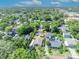 A charming single-story home, surrounded by lush greenery and mature trees at 1308 Oregon St, Orlando, FL 32803