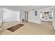 Open living room area with tile floors leading into the kitchen space at 1308 Oregon St, Orlando, FL 32803